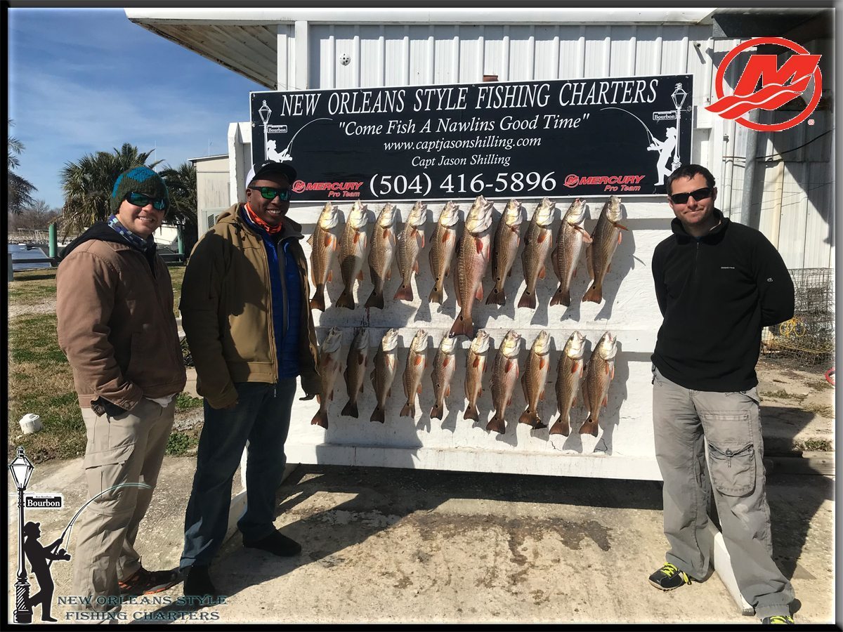 Friends catching fish together with New Orleans Style Fishing charter