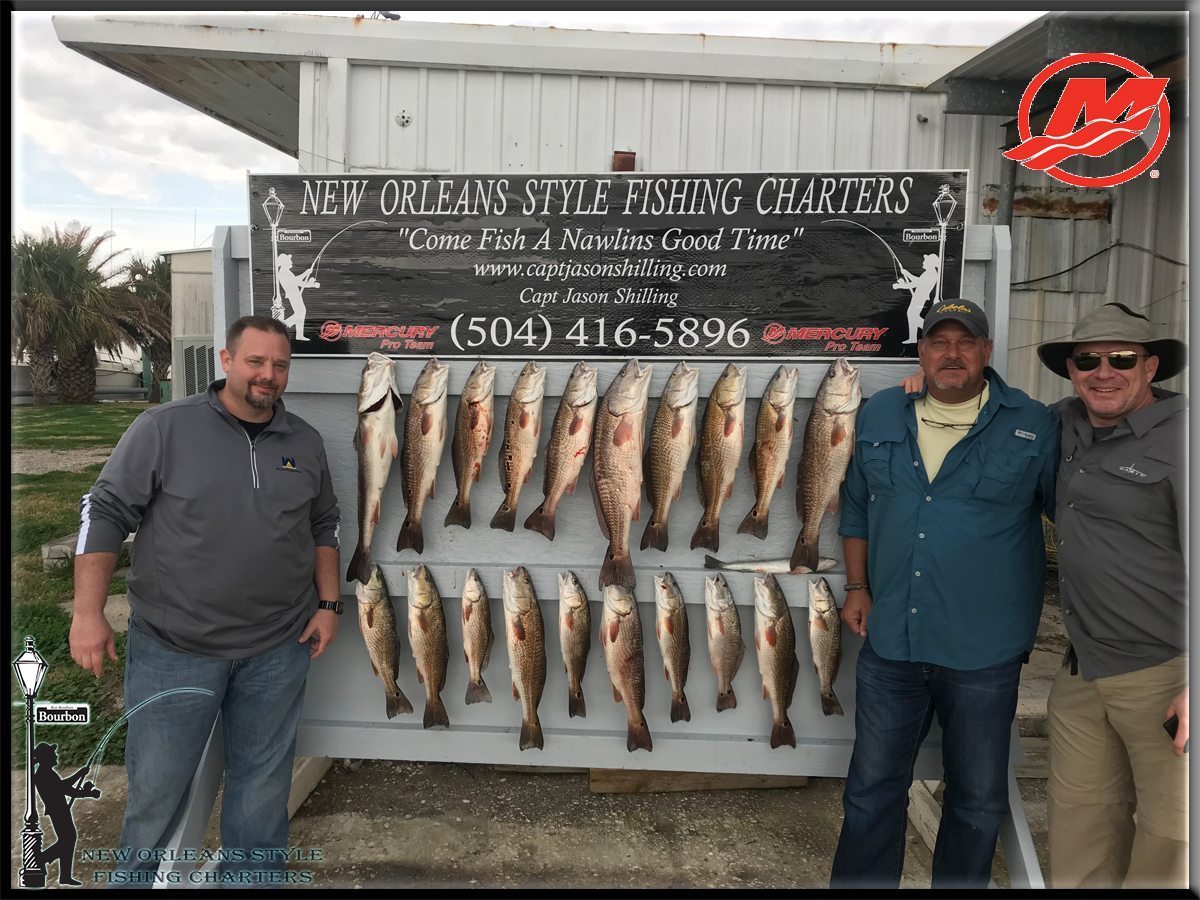 Group of old friends catching huge redfish